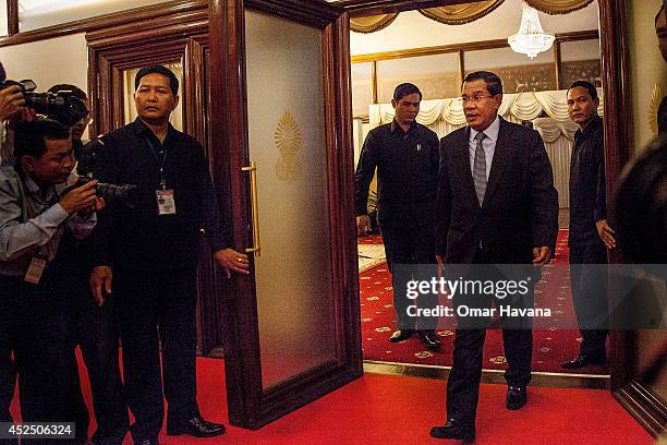 Cambodian Prime Minister Hun Sen addresses the media before a meeting with Sam Rainsy, President of the opposition Cambodia National Rescue Party,...