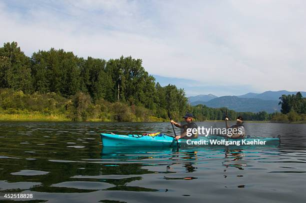 Idaho, Near Clark Fork, Lake Pend Oreille, Johnson Creek Area, People Kayaking, Model Released.