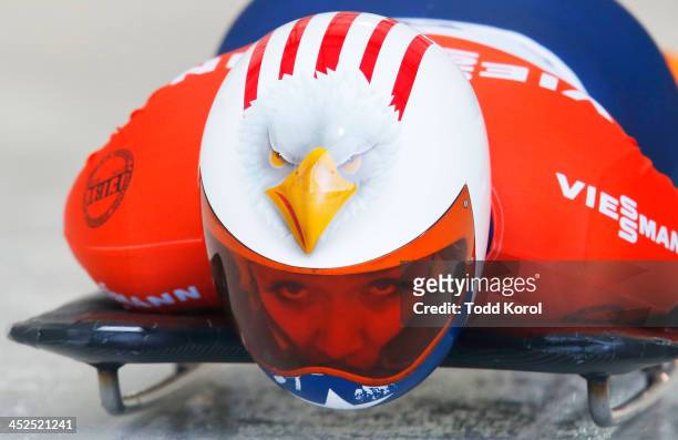 Katie Uhlaender of the U.S. Competes in the women's skeleton race during the 2013 IBSF World Cup race November 29, 2013 in Calgary, Alberta, Canada.
