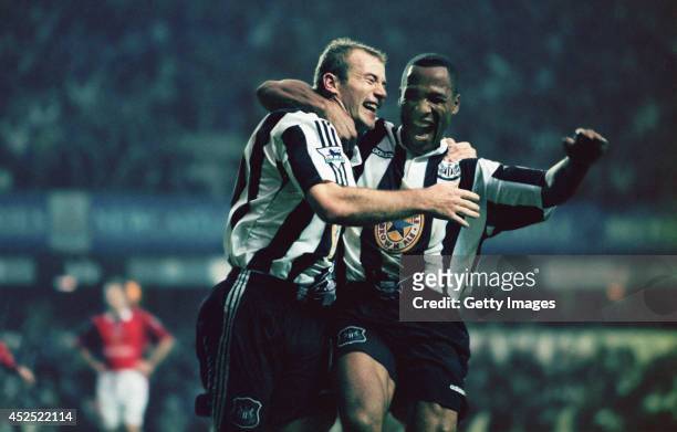 Newcastle strikers Alan Shearer and Les Ferdinand celebrate a goal during the Premiership match between Newcastle United and Manchester United at St...
