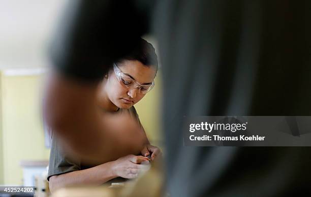 Female apprentice as metal worker in the workshop of Schaeffler Group on July 18 in Irapuato, Mexico. The Schaeffler Technologies AG & Co KG is a...