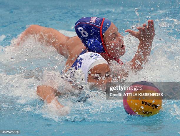 Hungary's Rita Keszthelyi fights for the ball with Russia's Maria Borisova during the women's Water Polo European Championships match Hungary vs...