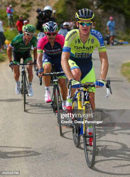 Michael Rogers of Australia and Tinkoff-Saxo leads Jose Rodolfo Serpa of Columbia and Lampre-Merida and Thomas Voeckler of France and Team Europcar...
