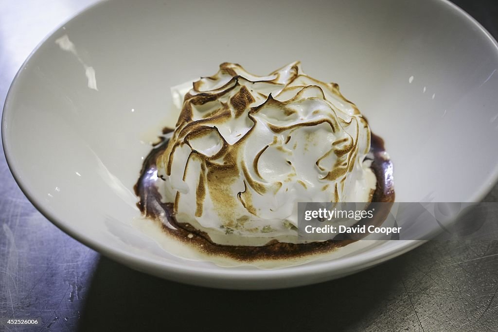 Montecito executive chef Matt Robertson (right) and executive pastry chef Steve Song (left) show us how they make the signature Ghostbusters-themed dessert,  the Baked Alaska.