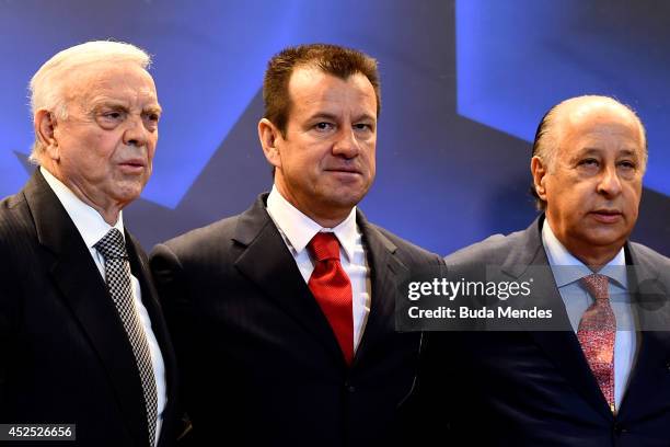 Carlos Dunga , president of the Brazilian Football Confederation , Jose Maria Marin and Marco Polo Del Nero pose for photo during a press conference...