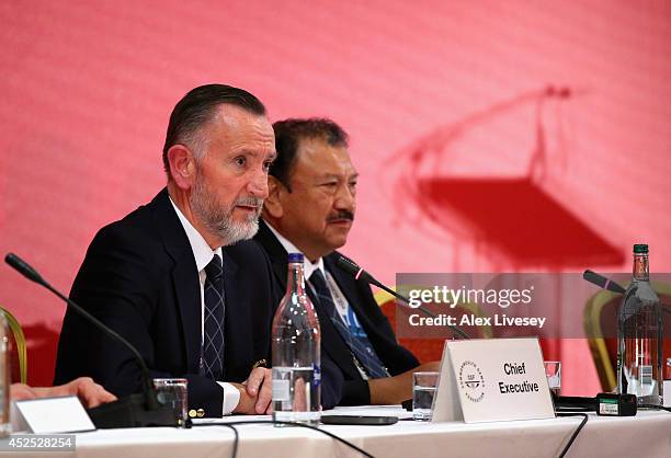 Mike Hooper the CGF CEO and HRH Prince Imran the CGF President face the media during a press conference at the Glasgow Hilton Hotel on July 22, 2014...