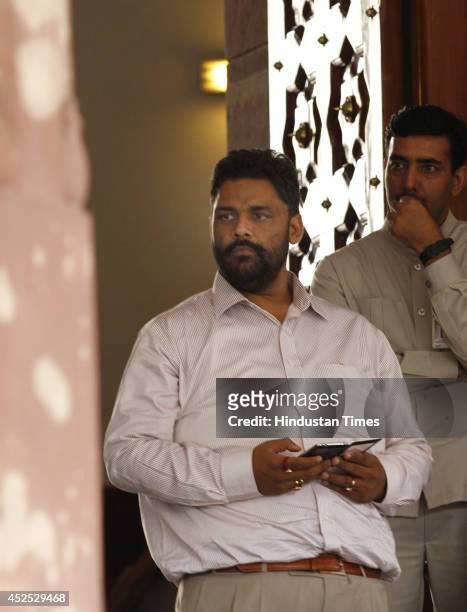 Pappu Yadav at Parliament house during the budget session on July 22, 2014 in New Delhi, India. Parliament was disrupted following an uproar by...