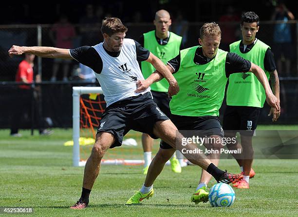 Steven Gerrard and Lucas Leiva of Liverpool in action during a training session at Harvard University on July 22, 2014 in Cambridge, Massachusetts.