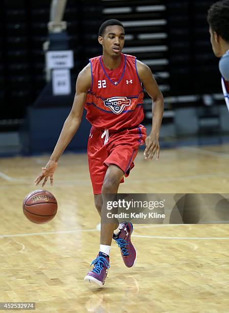 Terrence Ferguson in red brings the ball up the court during the National Basketball Players Association Top 100 Camp on June 17, 2014 at John Paul...