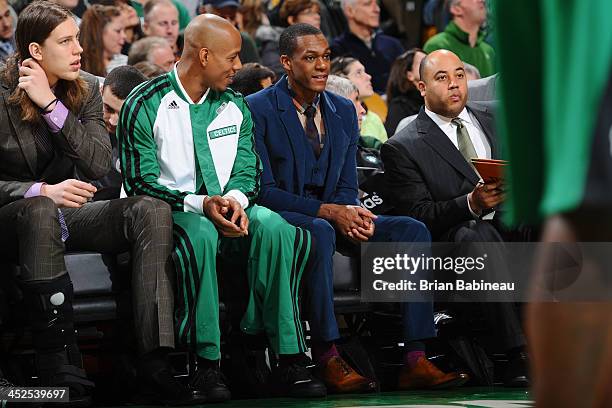 Rajon Rondo and Keith Bogans of the Boston Celtics chat during the game against the Cleveland Cavaliers on November 29, 2013 at the TD Garden in...