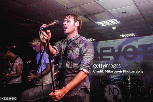 Lee Gaze, Stuart Richardson and Geoff Rickly of No Devotion performs on stage at Cardiff University on July 22, 2014 in Cardiff, United Kingdom.