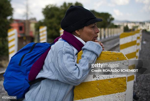 Central American migrant waits for the so-called La Bestia cargo train, in an attempt to reach the US border, in Apizaco, Tlaxcala state, Mexico on...