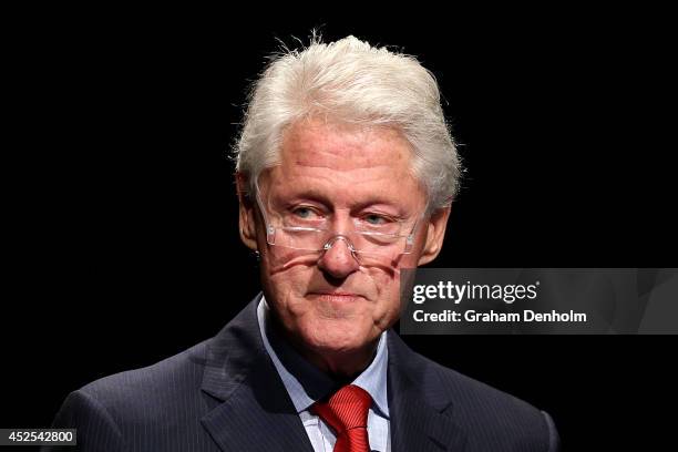 Former U.S. President Bill Clinton addresses the 20th International AIDS Conference at The Melbourne Convention and Exhibition Centre on July 23,...