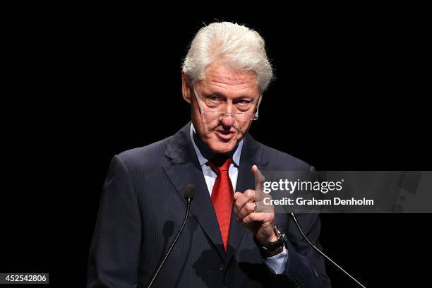 Former U.S. President Bill Clinton addresses the 20th International AIDS Conference at The Melbourne Convention and Exhibition Centre on July 23,...