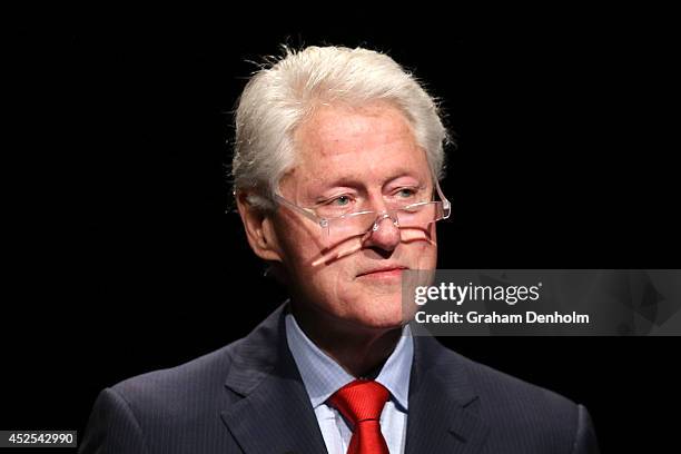 Former U.S. President Bill Clinton addresses the 20th International AIDS Conference at The Melbourne Convention and Exhibition Centre on July 23,...