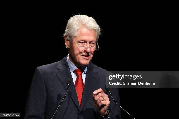 Former U.S. President Bill Clinton addresses the 20th International AIDS Conference at The Melbourne Convention and Exhibition Centre on July 23,...