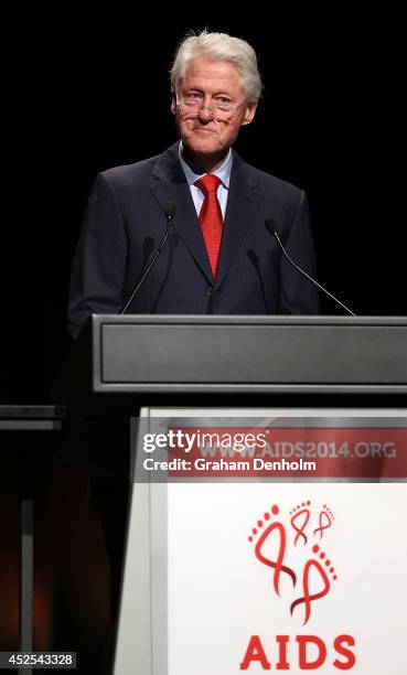 Former U.S. President Bill Clinton addresses the 20th International AIDS Conference at The Melbourne Convention and Exhibition Centre on July 23,...