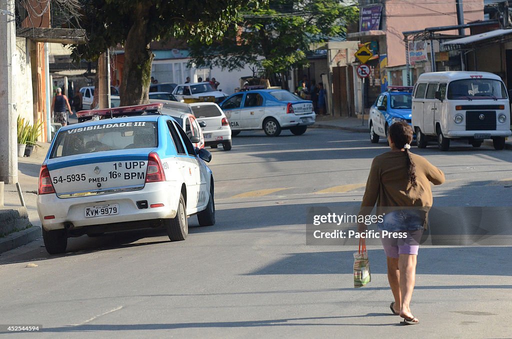 Policemen conducting at a checkpoint. According to the UPP,...