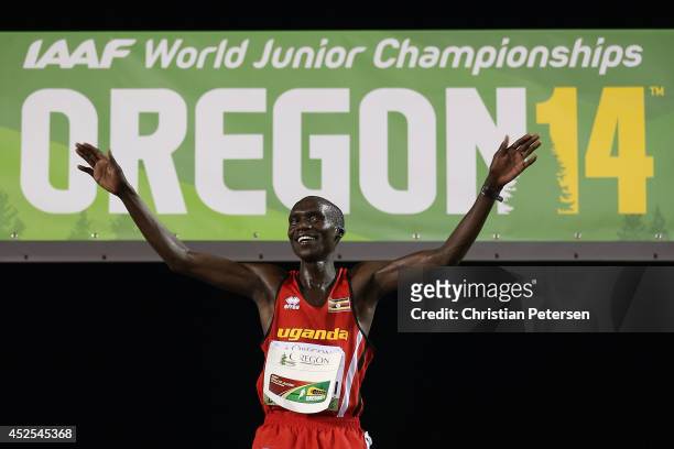 Joshua Kiprui Cheptegei of Uganda celebrates on the podium after winning the men's 10,000m final during day one of the IAAF World Junior...