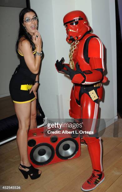 Actress/model Adrianne Curry with the Hip Hop Storm Trooper at Infolist.com's Pre-Comic-Con Bash held at Skybar on July 17, 2014 in West Hollywood,...