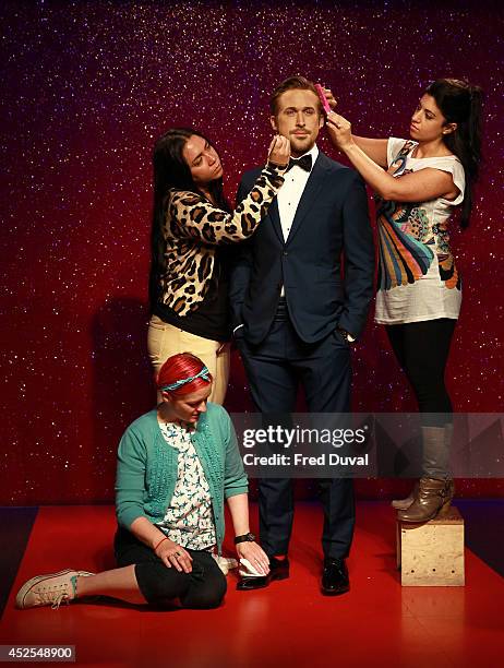 Ryan Gosling wax likeness is given a finishing touch-up as Madame Tussauds unveil their new Ryan Gosling wax figure at Madame Tussauds on July 23,...