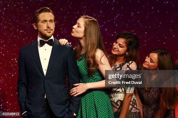Ryan Gosling wax likeness is admired by fans as Madame Tussauds unveil their new Ryan Gosling wax figure at Madame Tussauds on July 23, 2014 in...