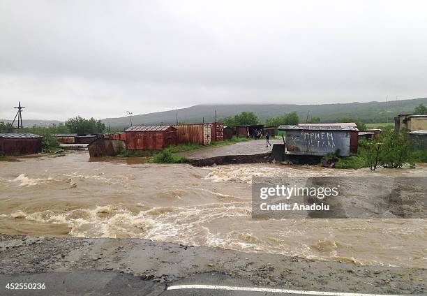 Roads, many buildings and residential areas get damaged during flood disaster happened in Magadan, Russia on July 23, 2014.