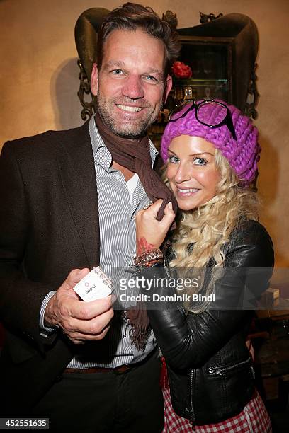 Kai Boecking and Nina Heyd attend the 'House of Capulet' shop opening on November 29, 2013 in Munich, Germany.
