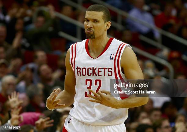 Francisco Garcia of the Houston Rockets celebrates a three-point shot during the game against the Brooklyn Nets at Toyota Center on November 29, 2013...