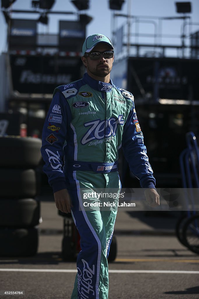 Pocono Ricky Rudd Ricky Stenhouse Jr., driver of the Zest Ford, stands in the garage ...