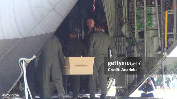 Farewell ceremony is held for 20 bodies of Malaysian Airlines Flight MH17 victims, to be sent to Netherlands from Kharkov International Airport, on...