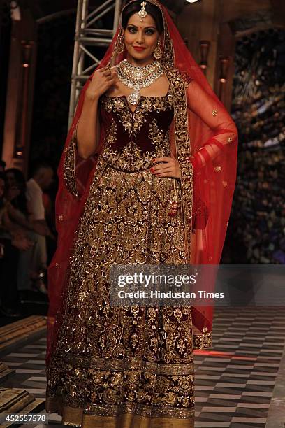 Actresses Bipasha Basu glided down the ramp in designer Rohit Bal lehanga for Shree Raj Mahal Jewellers at the India Couture Week 2014 finale held on...