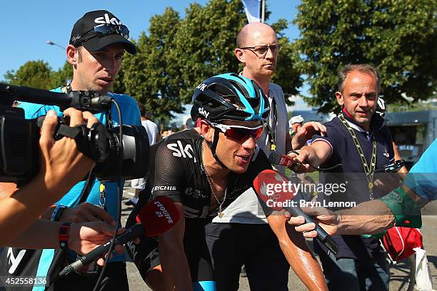 Richie Porte of Australia and Team SKY speaks to the media during the eleventh stage of the 2014 Tour de France, a 188km stage between Besancon and...