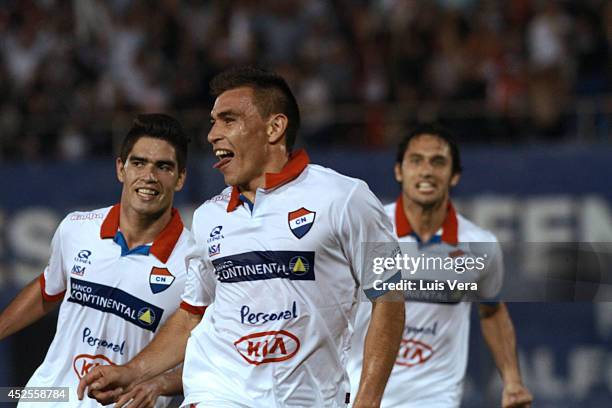 Derlis Orué of Nacional celebrates after scoring his team's second goal during a first leg semifinal match between Nacional and Defensor Sporting as...