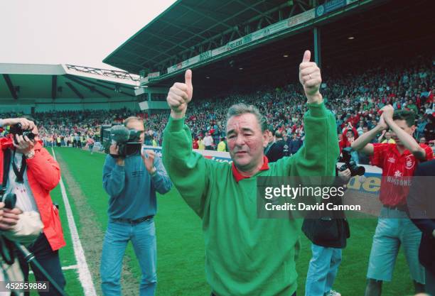 Nottingham Forest mananger Brian Clough salutes the fans after his last game in charge of the club before retiring. His forest side were relegated...