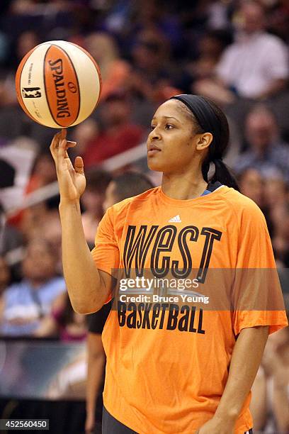 Maya Moore of the Western Conference All-Stars spins a ball on her finger during the 2014 Boost Mobile WNBA All-Star Game on July 19, 2014 at US...