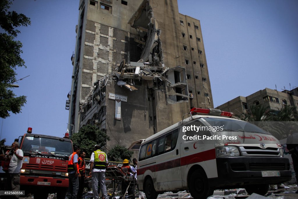 A Palestinian inspects the damage of the Al-Shalam (Peace)...