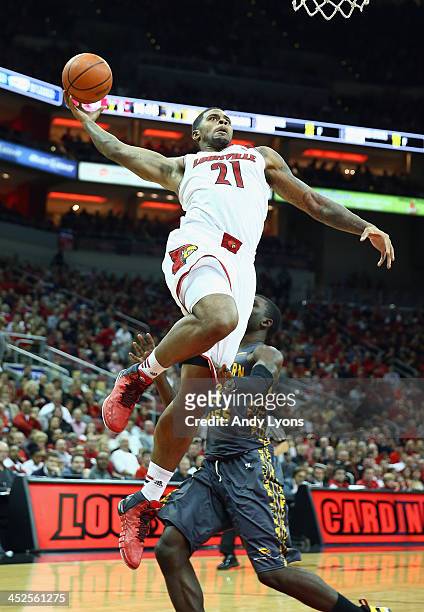 Chane Behanan of the Louisville Cardinals shoots the ball during the game against the Southern Mississippi Golden Eagles at KFC YUM! Center on...