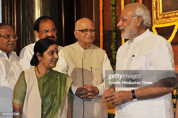 Prime Minister Narendra Modi, talking with Senior BJP leader LK Advani, External Affairs Minister Sushma Swaraj and Urban Development Minister M...