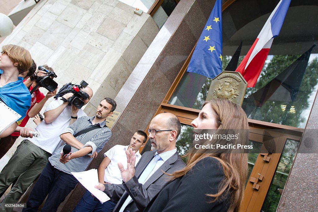 Representatives of the French Embassy with an address to...