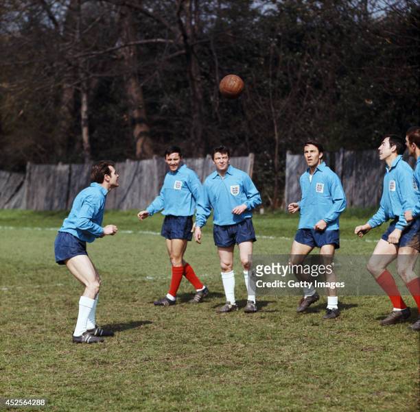 Jimmy Greaves and Gordon Banks train with England team mates in 1966.