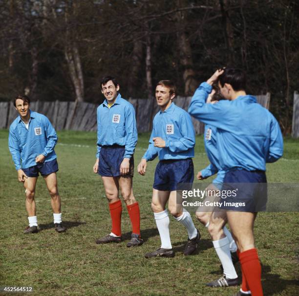 England players Jimmy Greaves Gordon Banks and Peter Thompson train with England team mates in 1966.