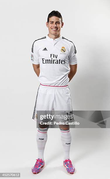 James Rodriguez poses during his official unveiling as a new Real Madrid player at Estadio Santiago Bernabeul on July 22, 2014 in Madrid, Spain.