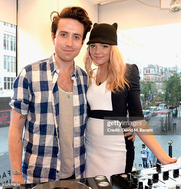 DJs Becca Dudley and Nick Grimshaw attend the French Connection #NeverMissATrick launch party at the Oxford Street Store on July 23, 2014 in London,...