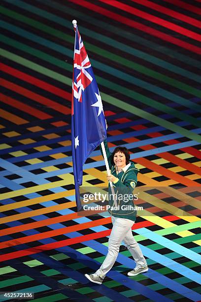 Flag bearer and Cyclist Anna Meares of Australia during the Opening Ceremony for the Glasgow 2014 Commonwealth Games at Celtic Park on July 23, 2014...