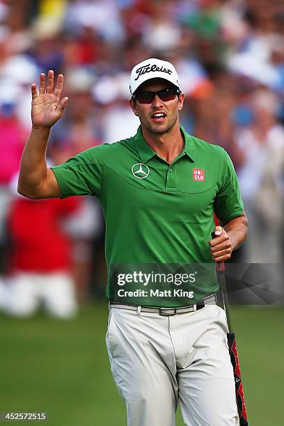 Adam Scott of Australia celebrates sinking his birdie putt on the 18th hole during day three of the Australian Open at Royal Sydney Golf Club on...