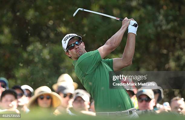 Adam Scott of Australia plays a tee-shot during day three of the Australian Open at Royal Sydney Golf Club on November 30, 2013 in Sydney, Australia.