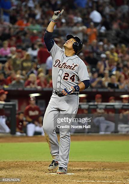 Miguel Cabrera of the Detroit Tigers points to the sky after hitting a three-run home run during the eighth inning against the Arizona Diamondbacks...