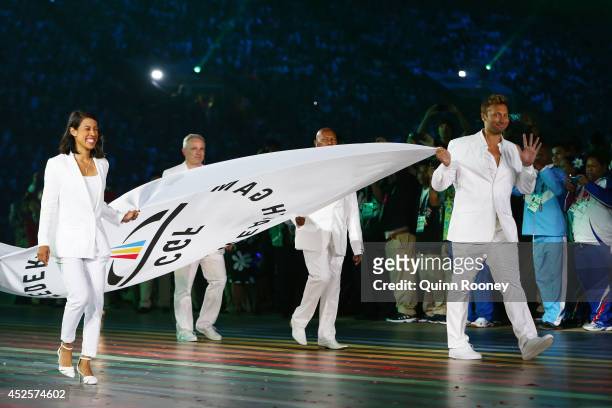Flag bearers, Squash player Nicol David of Malaysia and Swimmer Ian Thorpe of Australia during the Opening Ceremony for the Glasgow 2014 Commonwealth...
