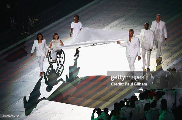 Flag bearers, Squash player Nicol David of Malaysia, Swimmer Ian Thorpe of Australia , Wheelchair Athlete Chantal Petitclerc of Canada, Athlete Kip...